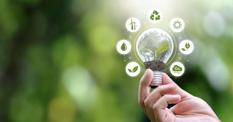 ESG Banners - Environment, Society and Governance hand holding light bulb with renewable energy icon Revolving Revenue