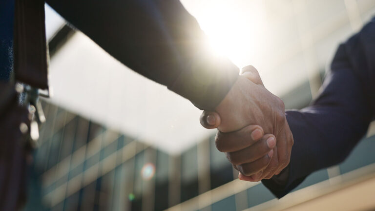 Stock image of business hand shaking
